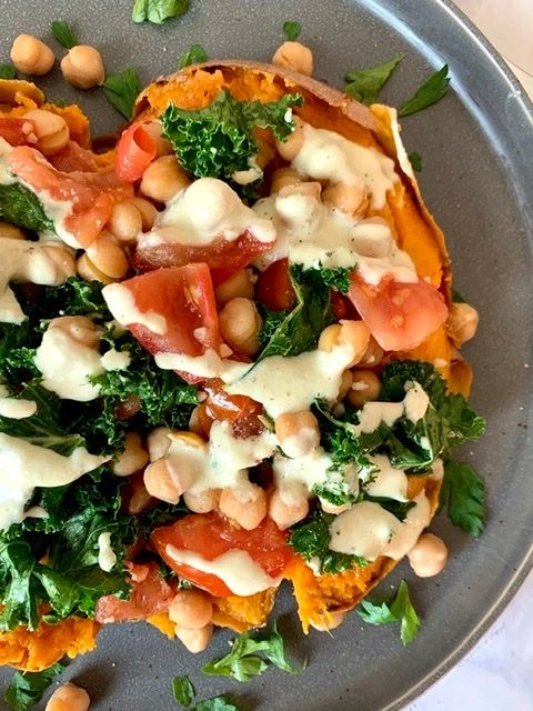 VEGAN CHICKPEA & KALE STUFFED SWEET POTATOES WITH ALFREDO SAUCE