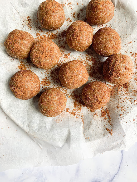 vegan cinnamon donut holes on a plate 