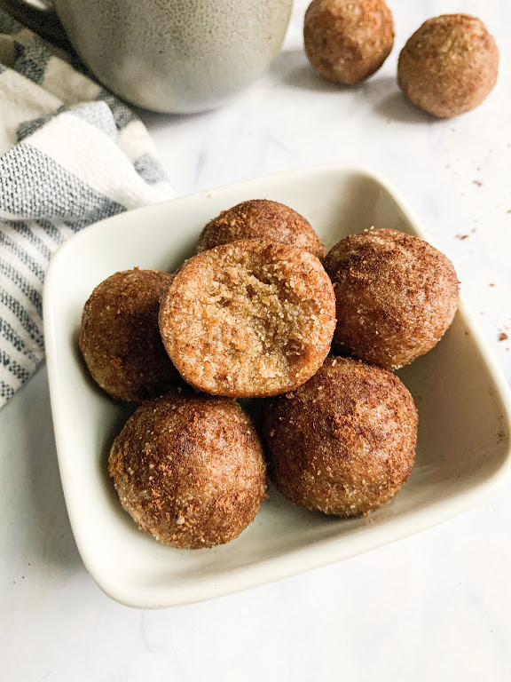 vegan cinnamon donut holes in a small bowl