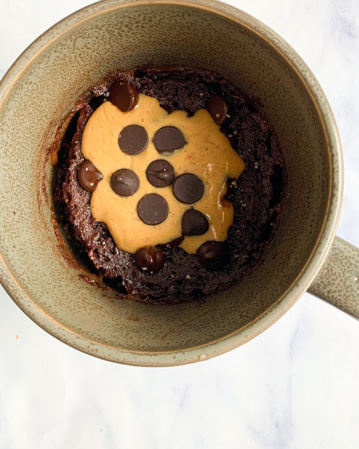 vegan fudgy peanut butter mug brownie in a grey mug