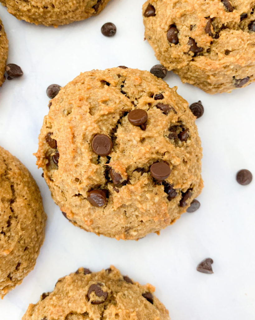 vegan banana chocolate chip cookies on a white marble counter top 