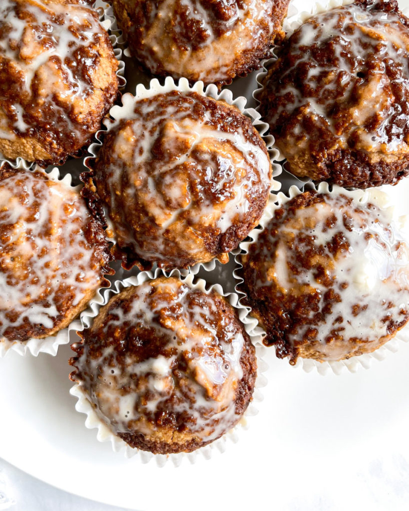 vegan oil-free cinnamon roll muffins on a white plate 