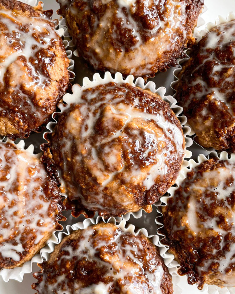 vegan cinnamon roll muffins on a white plate 