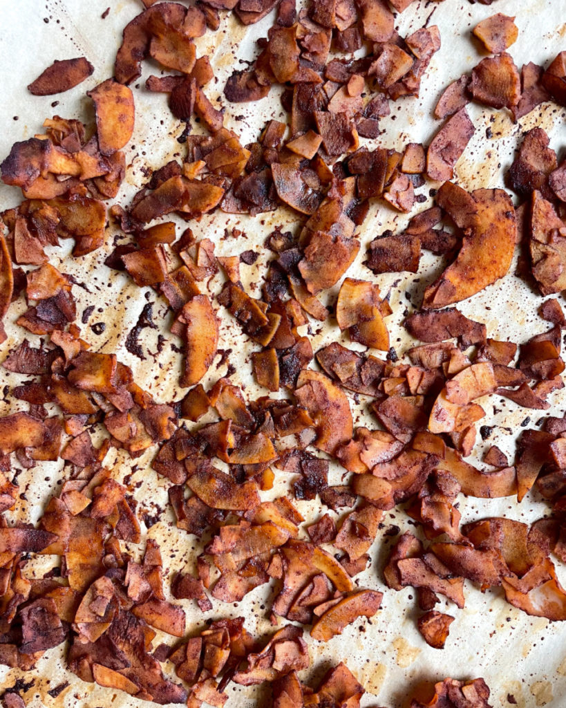 oil-free vegan coconut bacon on a baking sheet 