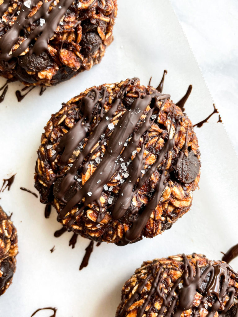 vegan no bake chocolate oat cookies on a white counter top 